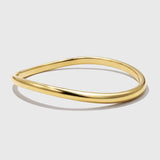 Bracelet jonc rigide doré légèrement torsadé
